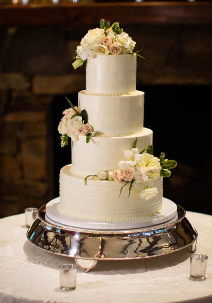 White Buttercream Wedding Cake with Pearls and Flowers