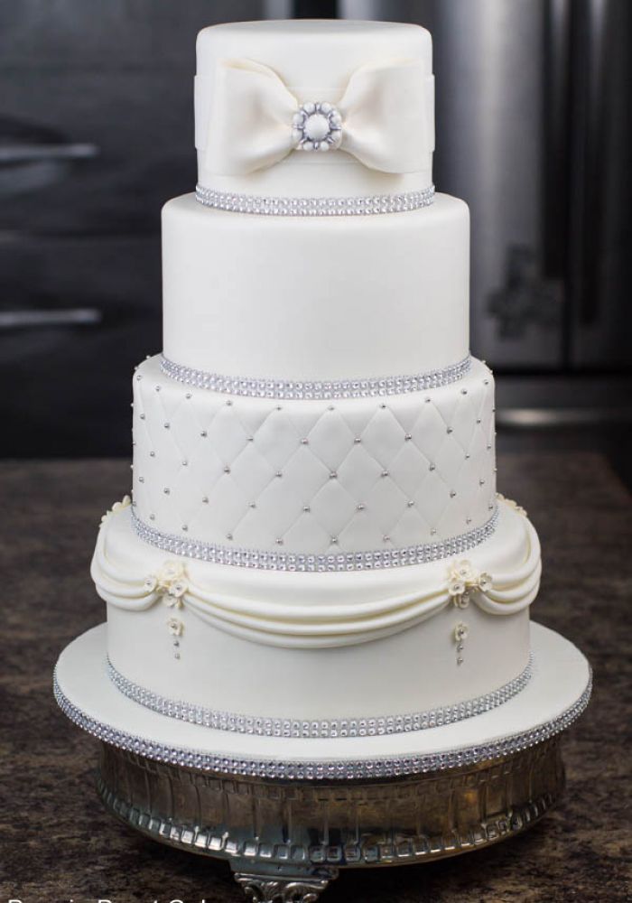 White Fondant Wedding Cake with Sequins and a Bow