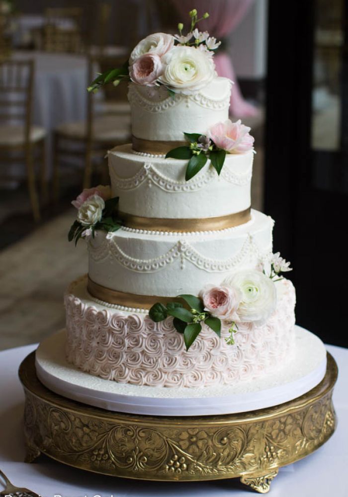 Elegant Buttercream Wedding Cake with Lace Detail and Fresh Flowers